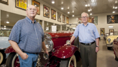 Michael Pratt stands with Jim Rogers among the massive amount of cars in Rogers’ collection Tuesday, Sept. 20, 2011. Pratt is director of transportation for Rogers’ collection and has been responsible for tracking down a majority of the vehicles.